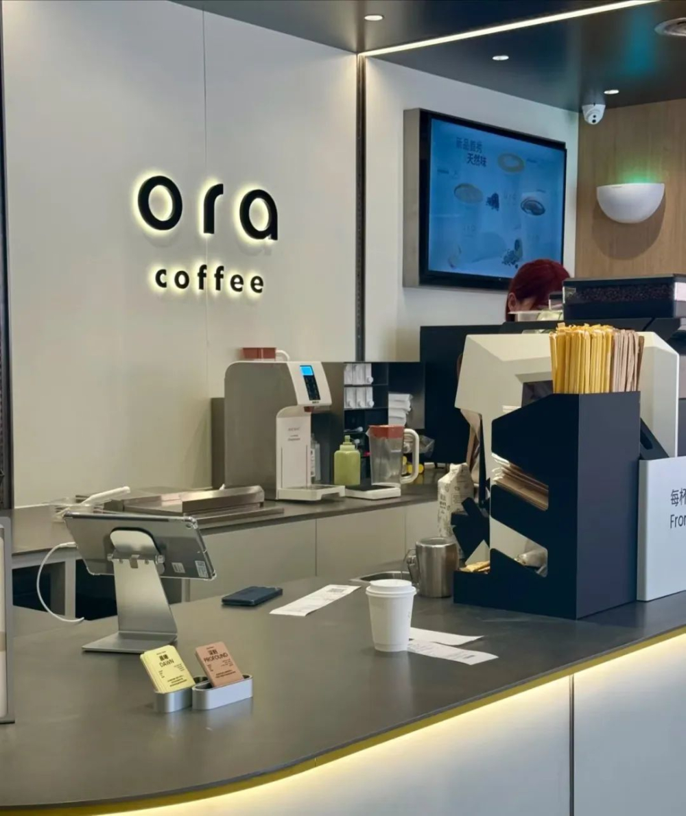 Papa John's Coffee's subsidiary Ora Coffee tests the waters of the 9.9-yuan budget market, with an all-in-one machine and strategy analysis