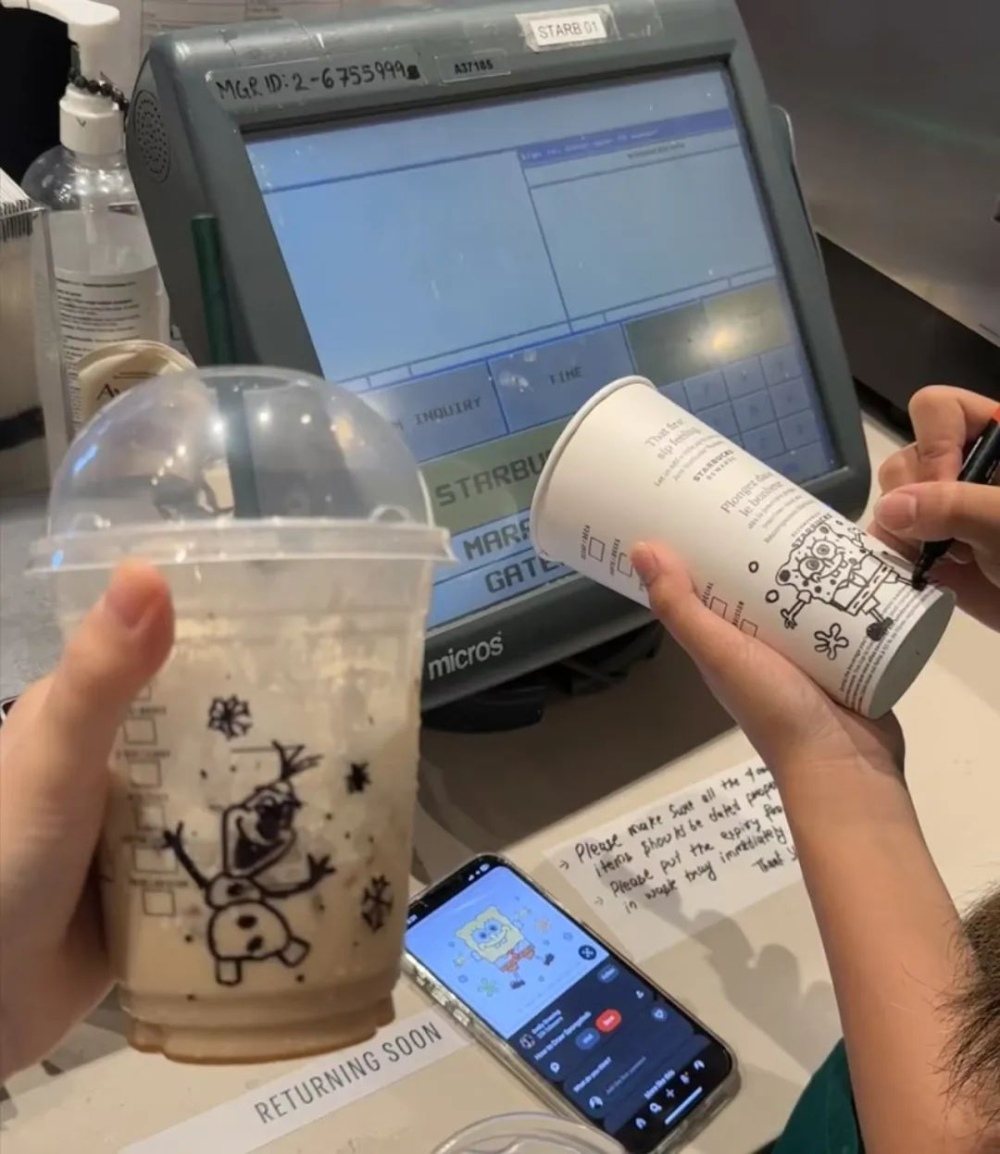 Starbucks' return of hand-drawn paper cups sparks debate: Customers love them, but staff say it's stressful